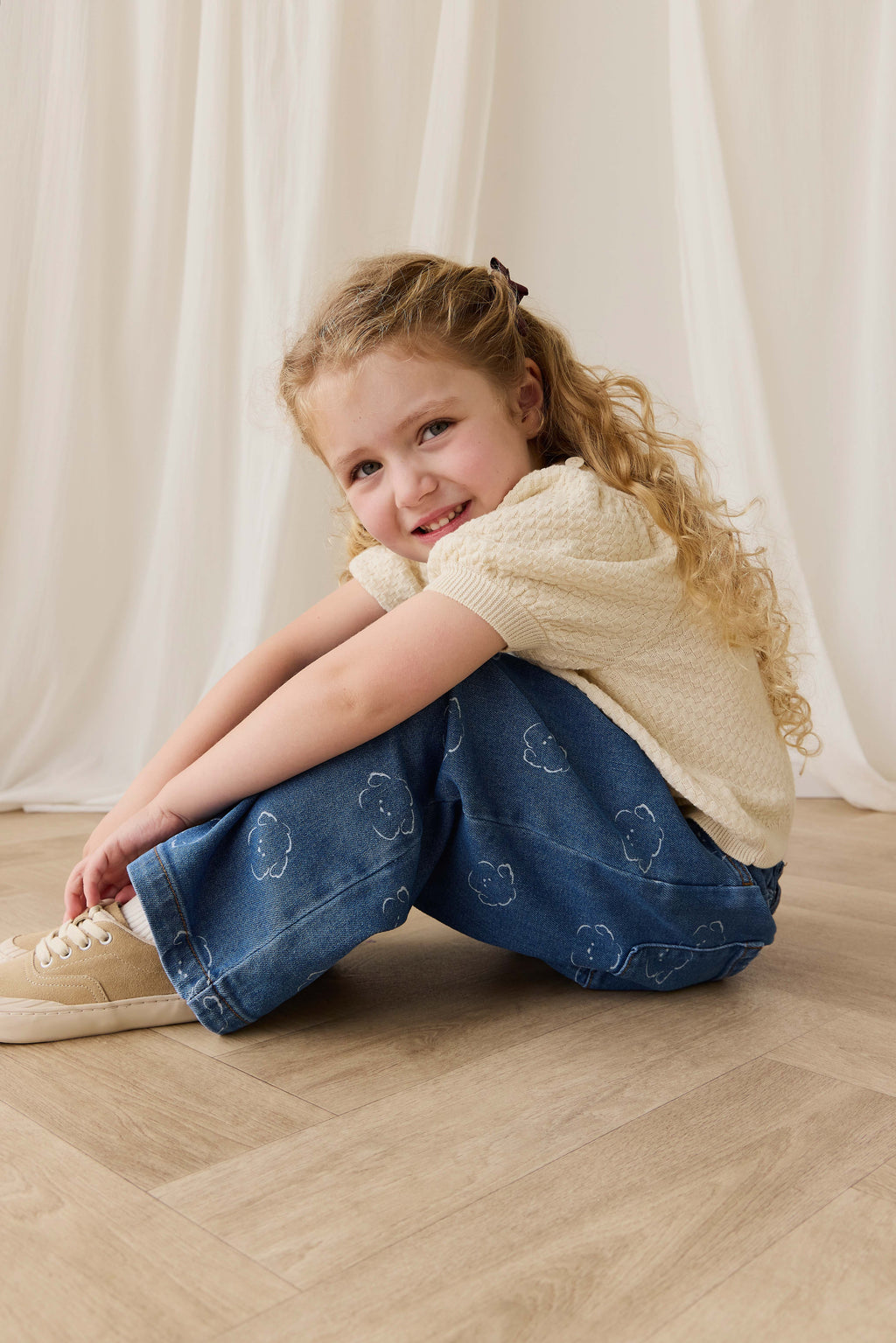 Haut smocké romantique en coton uni Cornsilk avec manches bouffantes et tricot texturé pour enfants de 6 mois à 10 ans