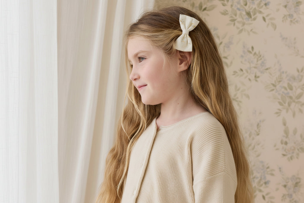 Chouchou en coton biologique « Parchemin fleuri » délicat pour bébés et tout-petits