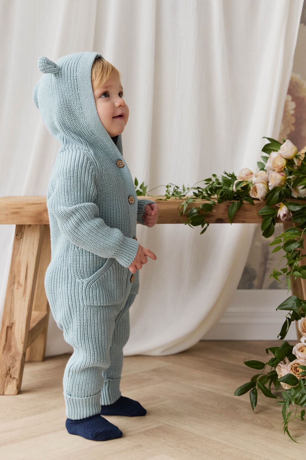 Grenouillère à capuche en tricot de coton uni bleu poudré douillette avec détails oreilles et poignets côtelés pour bébés 0-3 ans