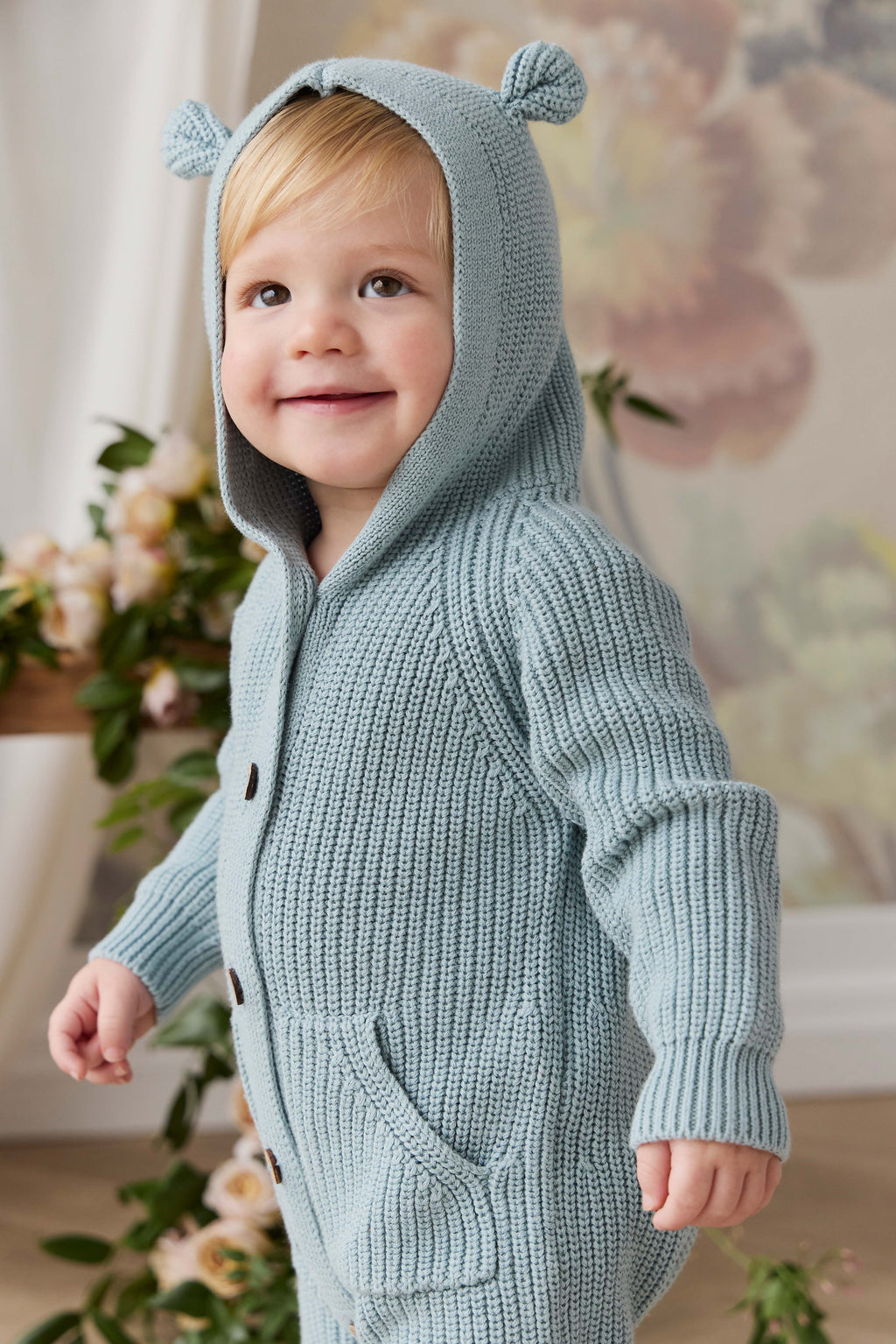 Grenouillère à capuche en tricot de coton uni bleu poudré douillette avec détails oreilles et poignets côtelés pour bébés 0-3 ans