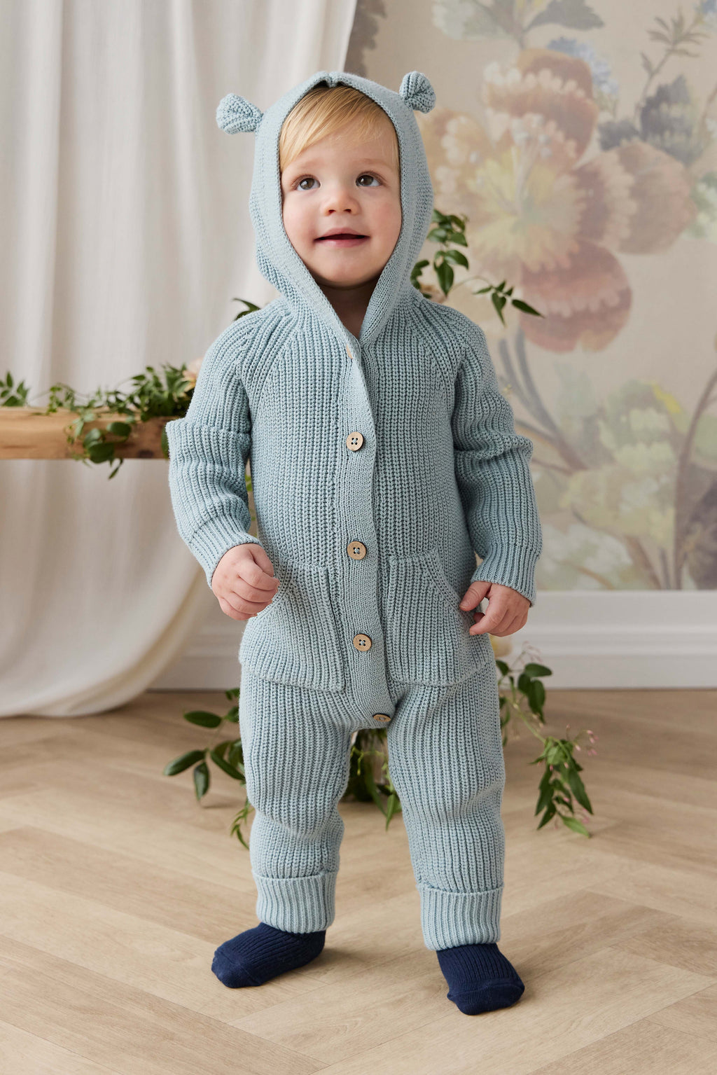 Grenouillère à capuche en tricot de coton uni bleu poudré douillette avec détails oreilles et poignets côtelés pour bébés 0-3 ans