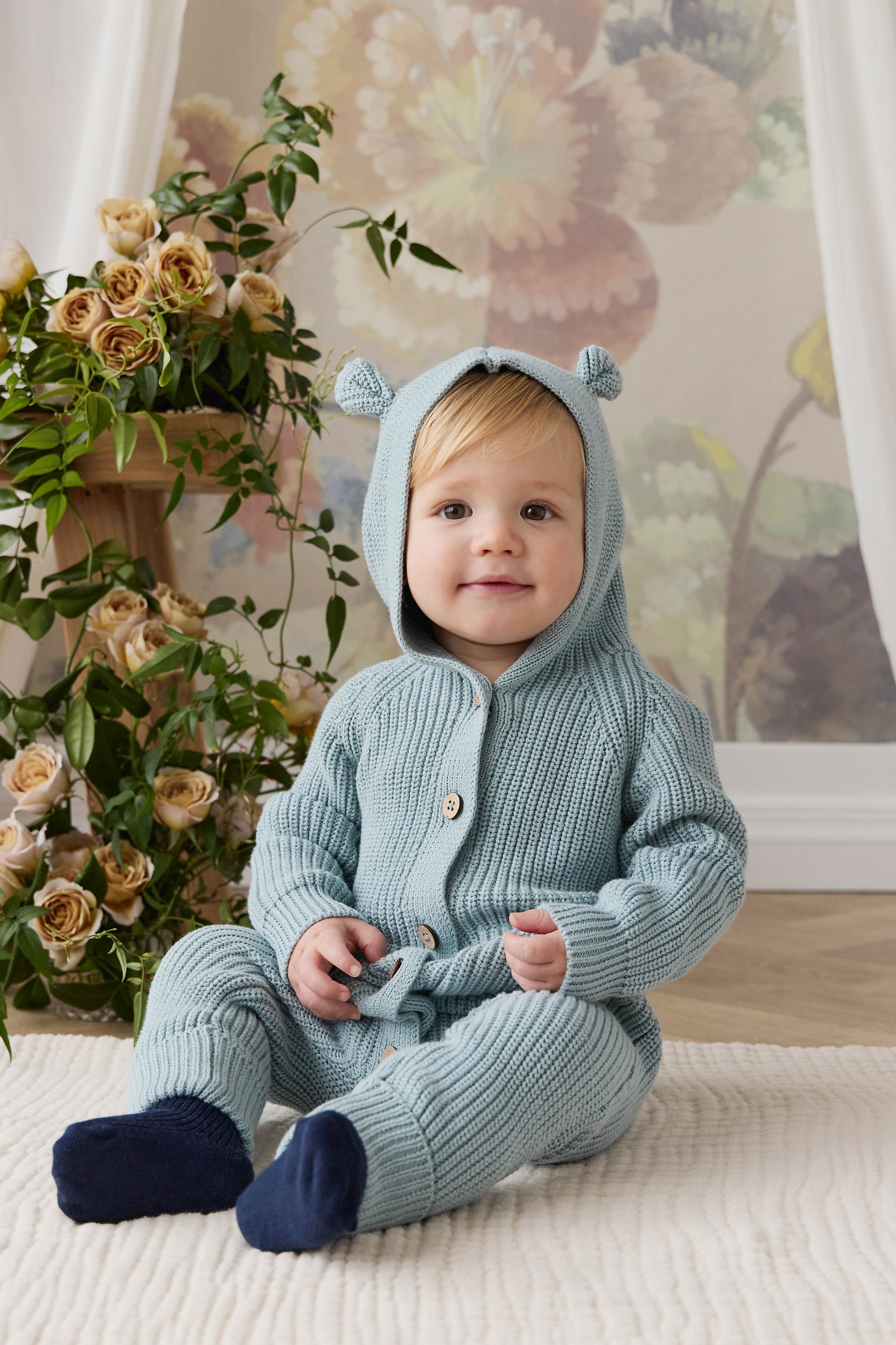 Grenouillère à capuche en tricot de coton uni bleu poudré douillette avec détails oreilles et poignets côtelés pour bébés 0-3 ans