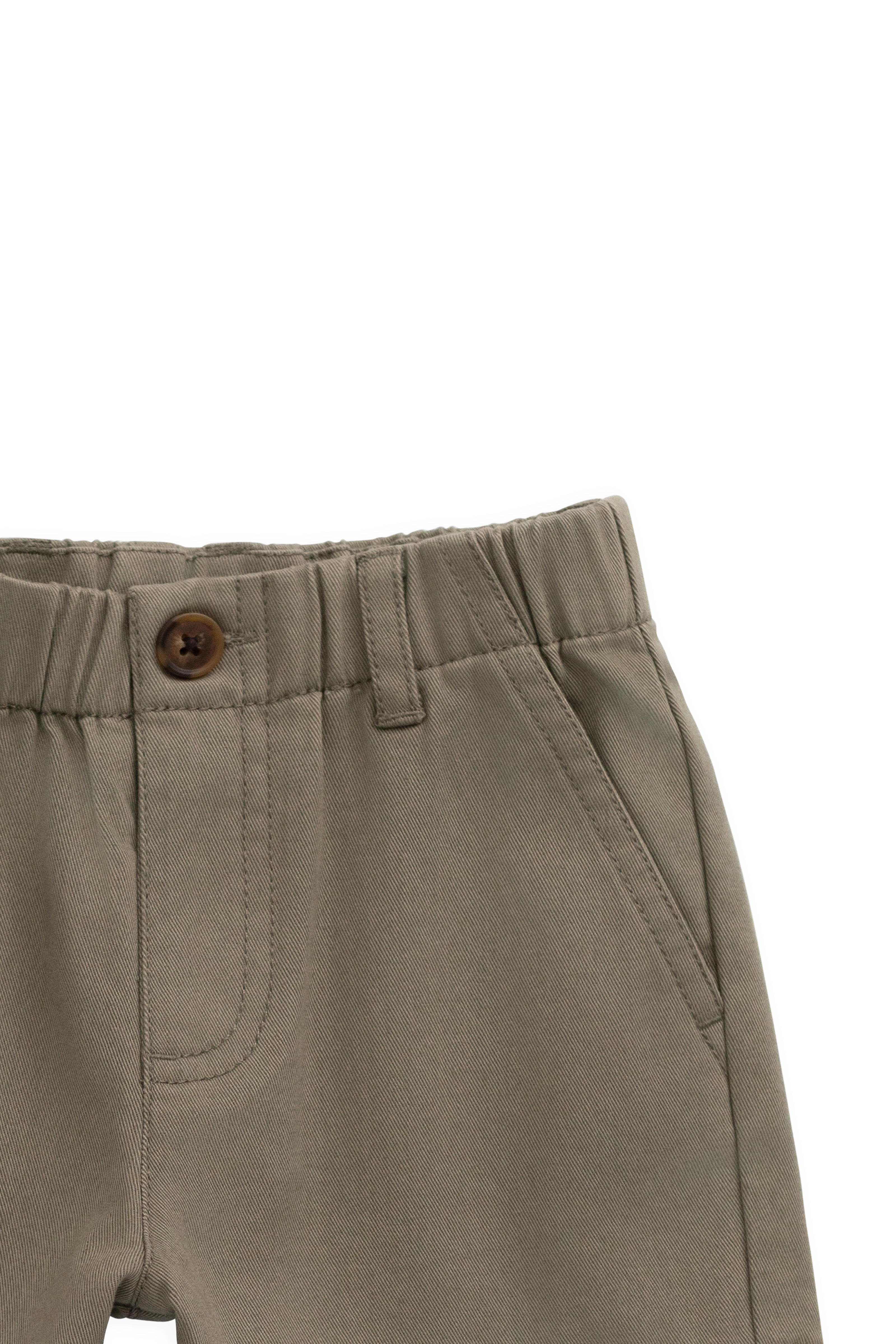 Short décontracté en coton uni aux tons naturels avec taille élastique et poches fonctionnelles pour enfants de 6 mois à 8 ans