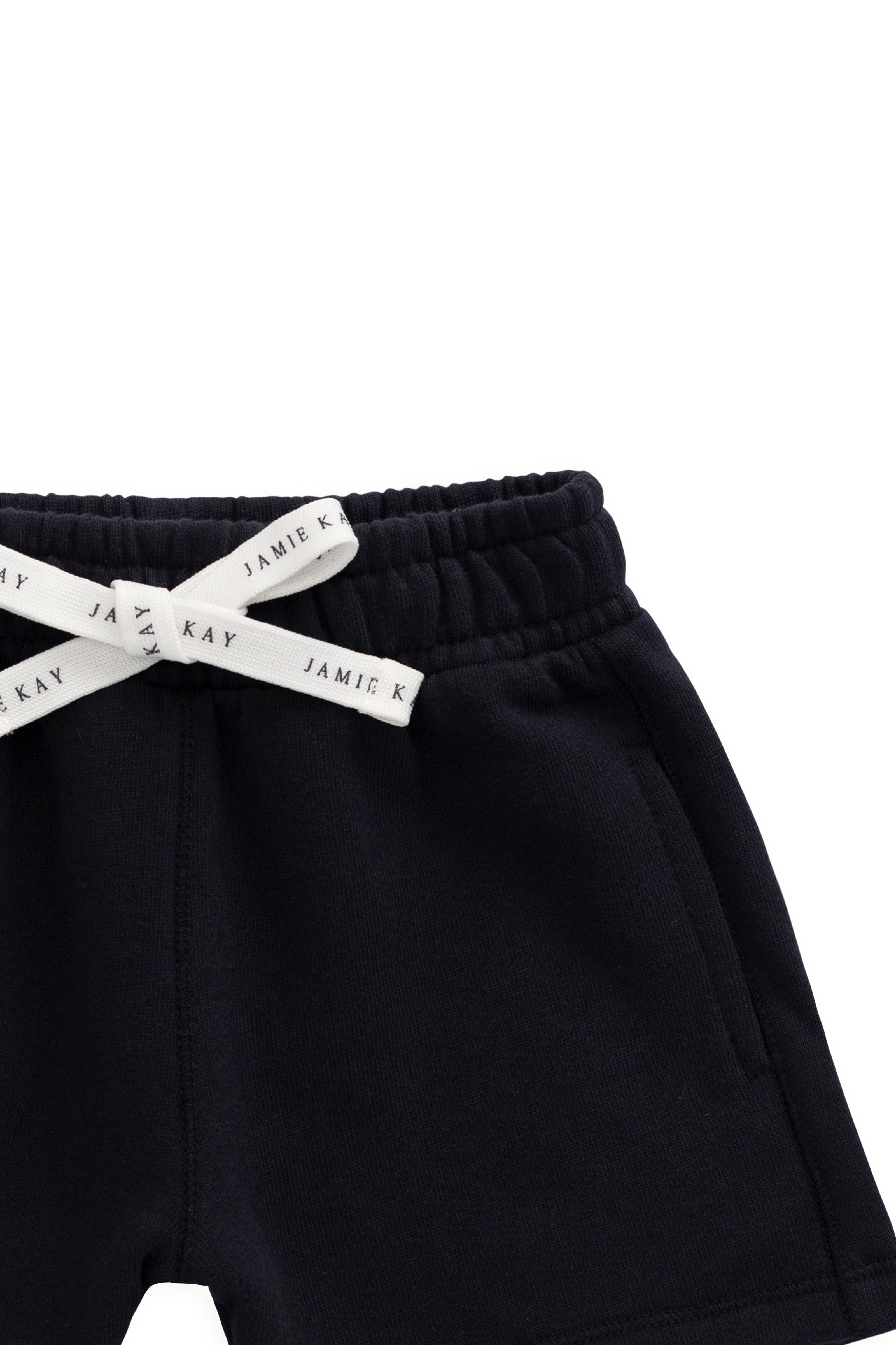 Short ample bleu marine en coton biologique avec taille élastiquée et cordon de serrage avec nœud pour enfants de 6 mois à 8 ans